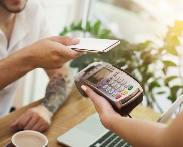 Person Paying with Digital Wallet Device