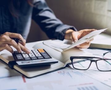 Person Looking At Bills