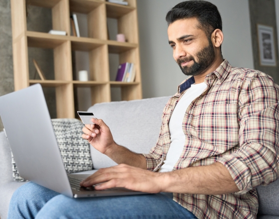 Man Looking at Laptop