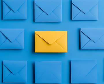 yellow and blue envelopes against blue background
