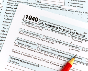 1040 tax form with pencil